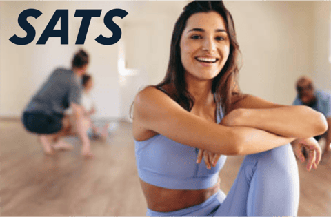 lady doing yoga with SATS logo 